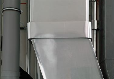 Detail of a technical duct with silver facing for a news thumbnail.