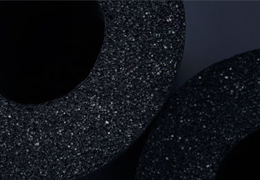 Small web thumbnail showing black elastomeric pipe insulation texture.