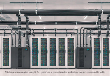 Data center server room with insulated overhead piping and cooling equipment.